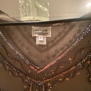 Never worn Unique Vintage dress.